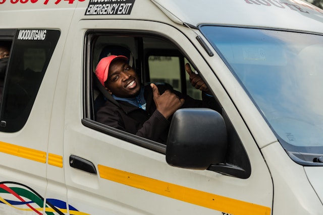 frican Taxi driver driving passengers during Corona Virus Pandemic in South Africa