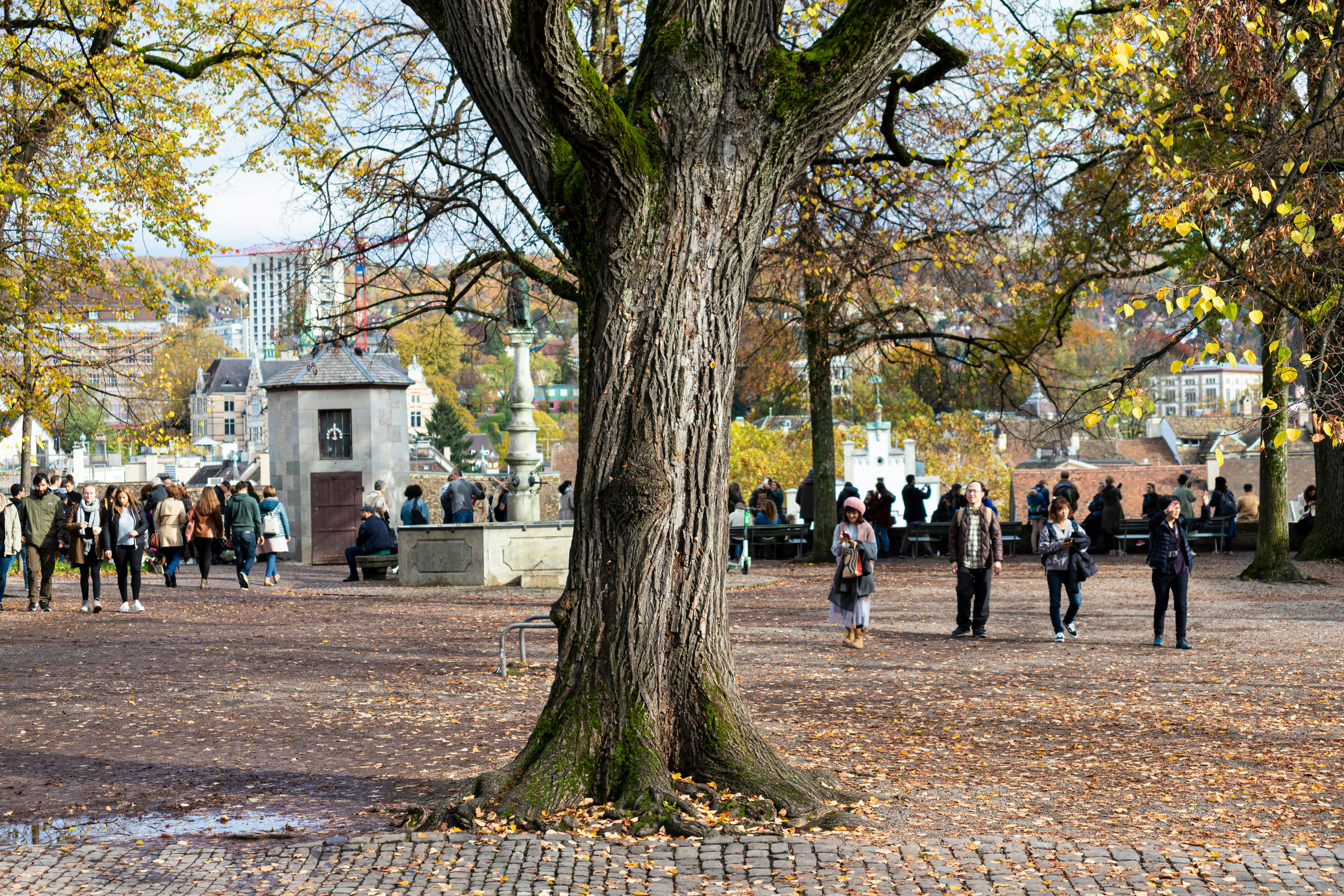 People walking through Lindenhof plaza in Zürich, Switzerland