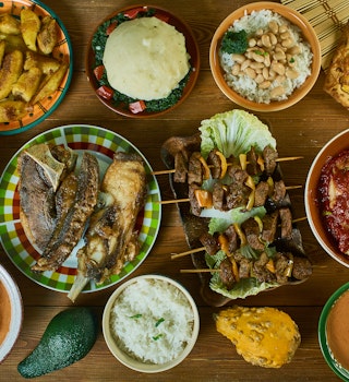 Tanzanian cuisine, Traditional assorted African dishes, Top view.; Shutterstock ID 1625646943; your: Sloane Tucker; gl: 65050; netsuite: Online Editorial; full: Tanzania Eat and Drink Article