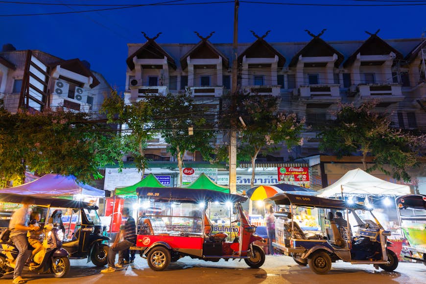 Rickshaws lined up outside the Saturday Night Market, Chiang Mai, Thailand
