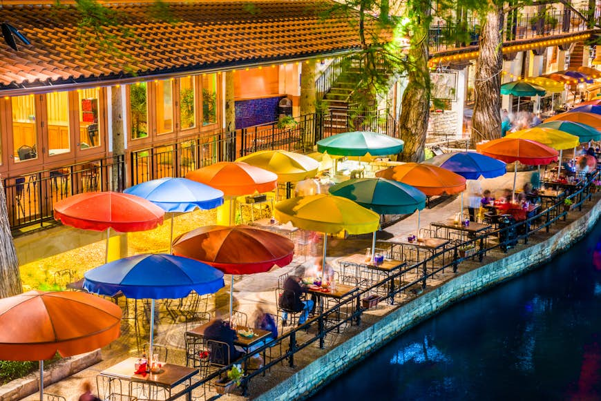 San Antonio Riverwalk, Texas, scenic river canal tourism restaurant umbrellas