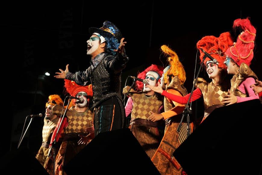 Performers in costume and face paint during a carnaval murga show, Montevideo, Uruguay, South America