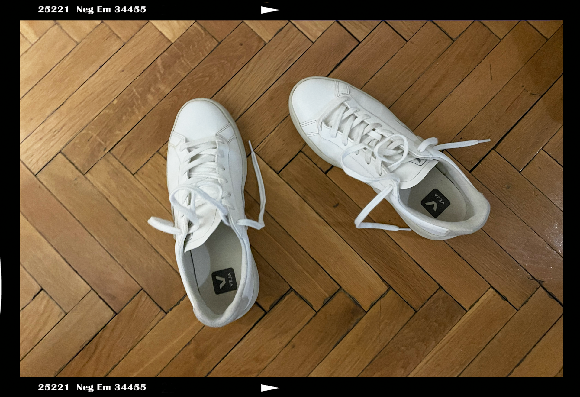 White Veja walking shoes