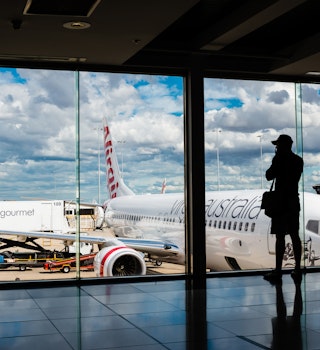 MELBOURNE, VICTORIA/AUSTRALIA, MARCH 17TH: Image of a Virgin Australia passenger airliner taxiing at Melbourne Airport on 17th March, 2014 in Melbourne; Shutterstock ID 187346579; your: Brian Healy; gl: 65050; netsuite: Lonely Planet Online Editorial; ful