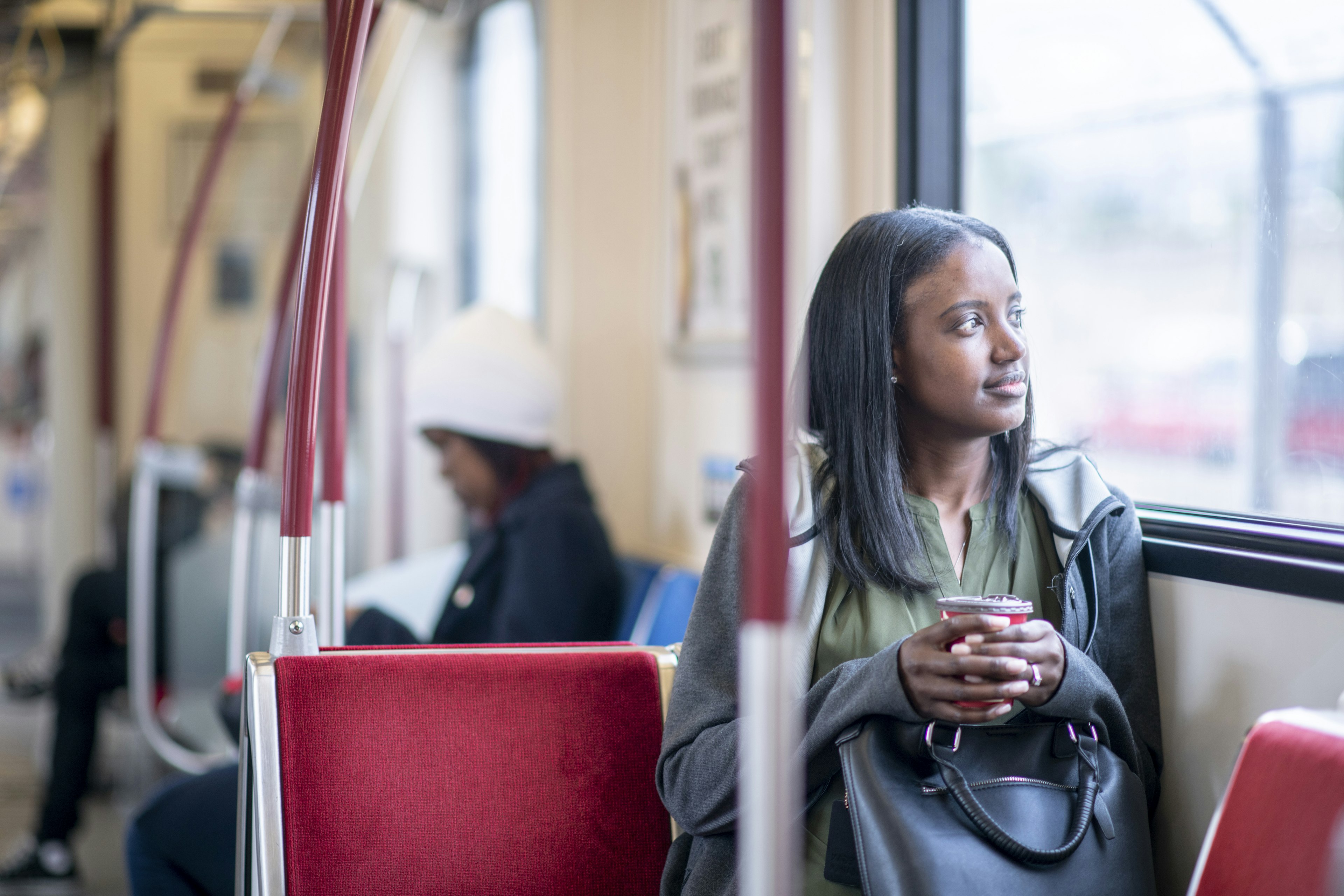 Woman riding the bus in Toronto, Canada