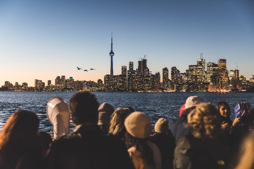 Tourists ride the ferry in Toronto, Canada
