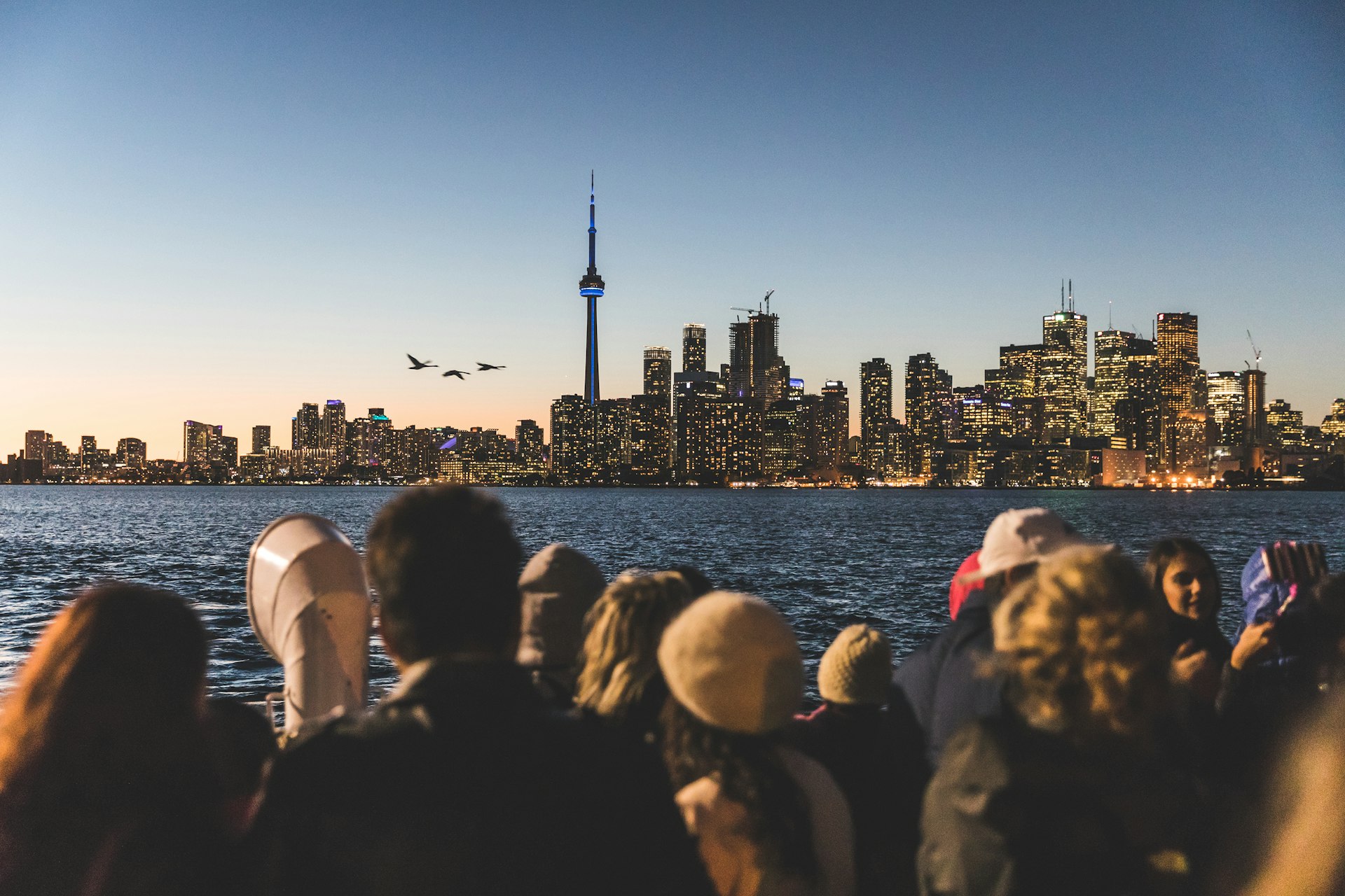 Tourists ride the ferry in Toronto, Canada