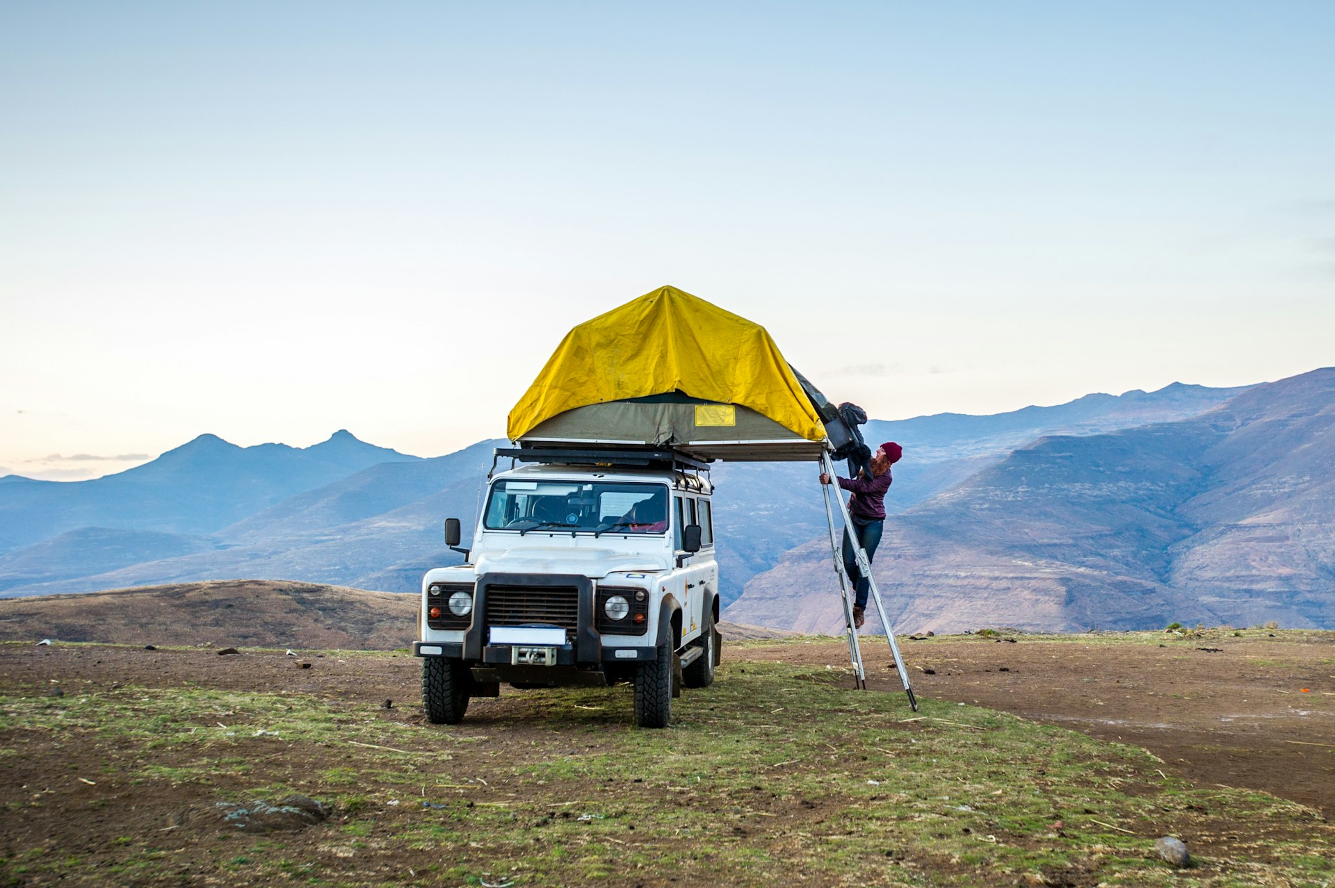 A rooftop tent set among the mountains of Lesotho, Africa