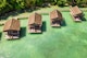 June 28, 2019 - Raja Ampat, Indonesia: High angle shot of the overwater bungalows along the coast of the Raja Ampat Islands in Indonesia