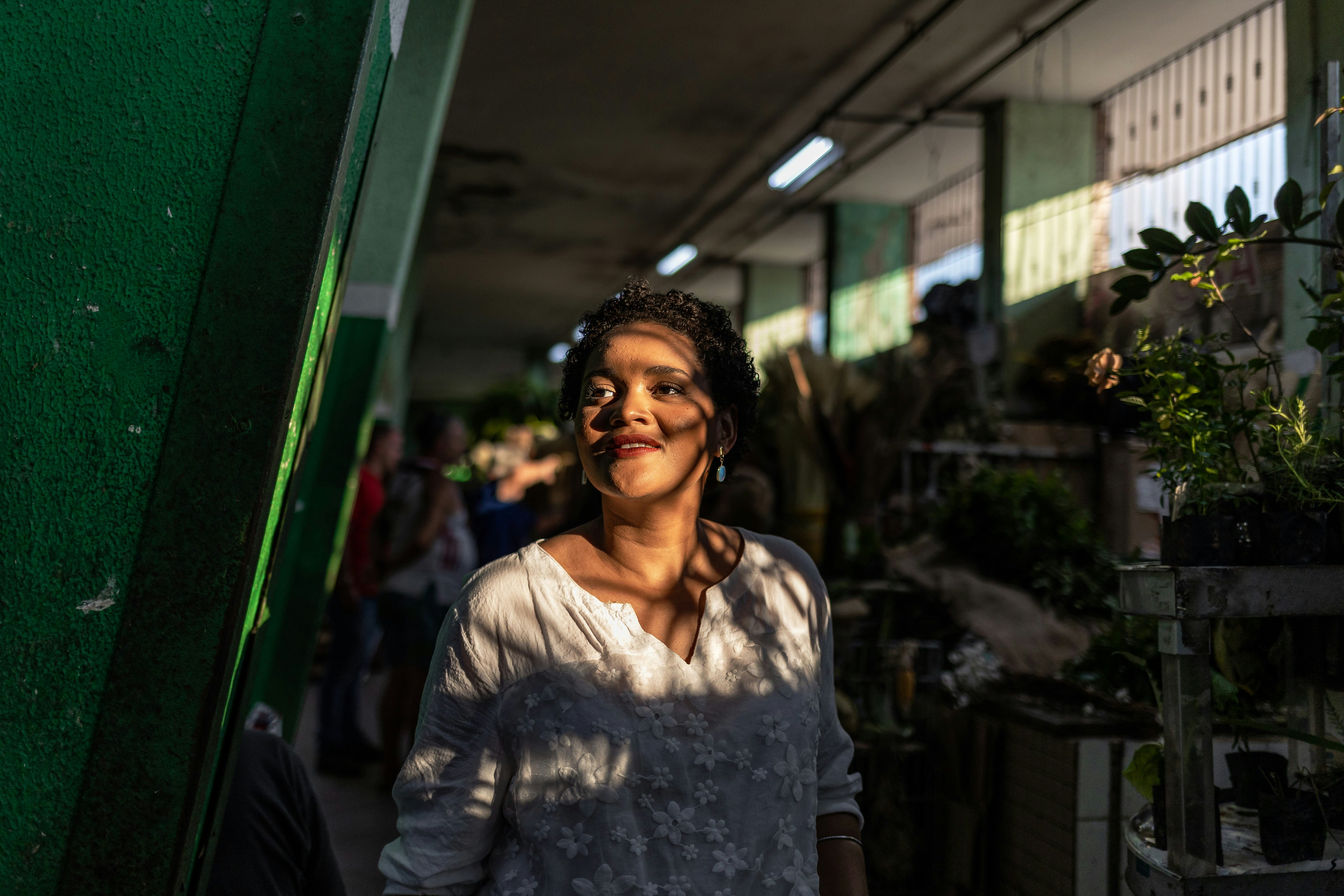 Tour guide Rayanne Moreira gives a tour of the popular shopping mall, Mercadão de Madureira