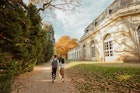 Tourists walk in the gardens of Pillnitz Castle in Dresden © Elizaveta Kovaleva/Lonely Planet