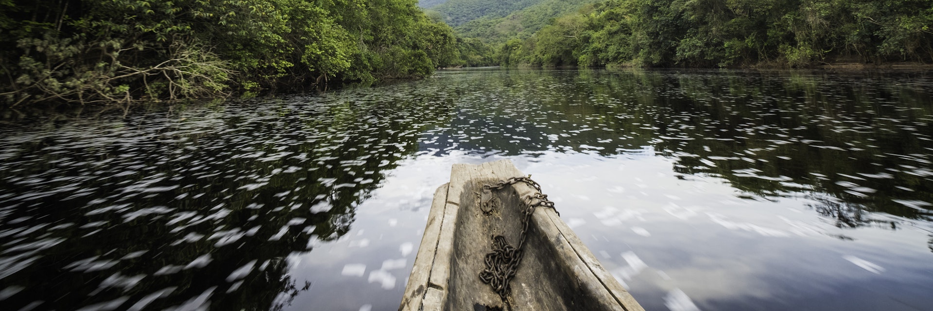 Beautiful blue sky reflecting in the Amazonia Basin river. Corocoro river goes along Yutaje Community whicth mean in the native language:  River Foam (Espuma del Rio)