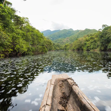 Beautiful blue sky reflecting in the Amazonia Basin river. Corocoro river goes along Yutaje Community whicth mean in the native language: River Foam (Espuma del Rio)