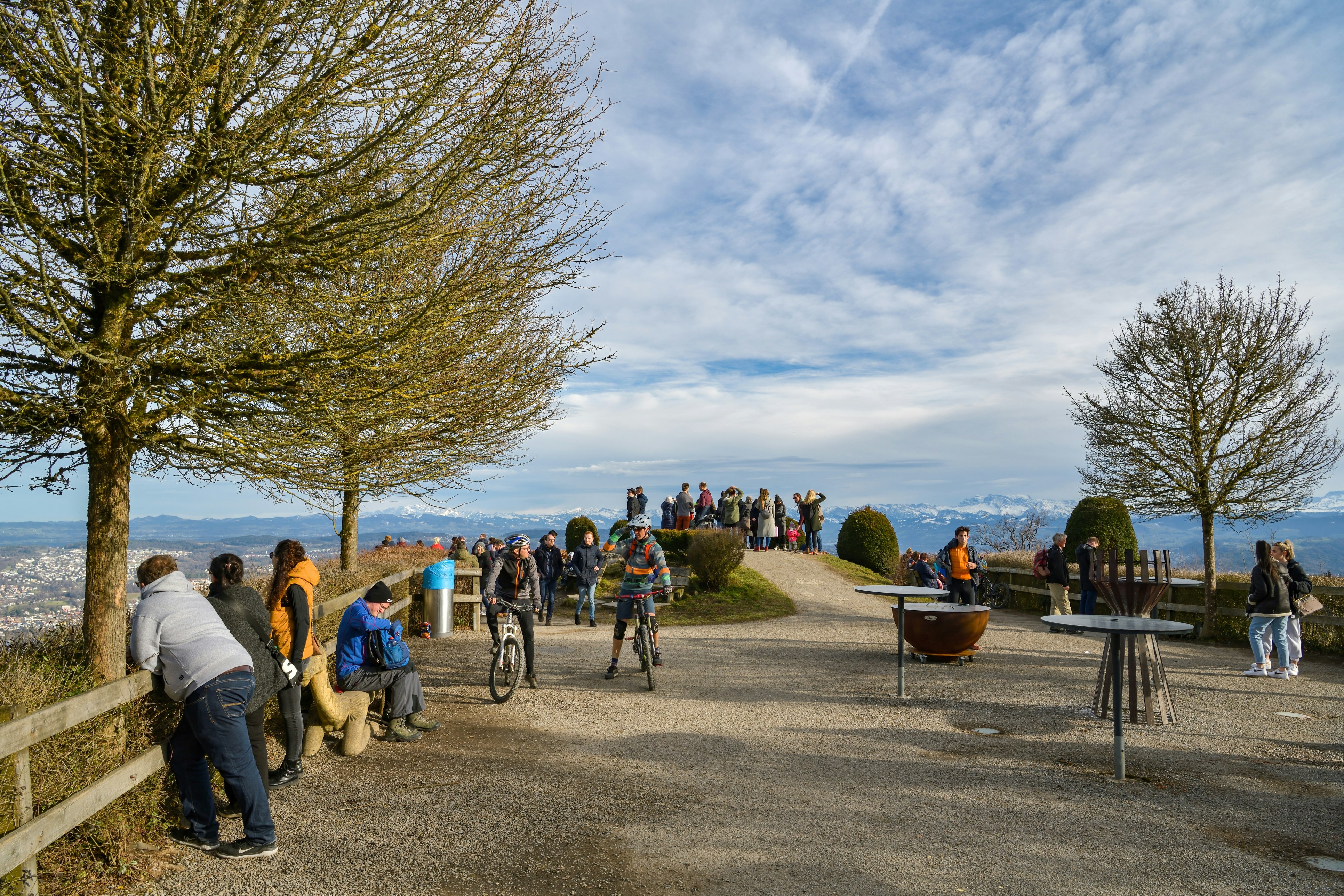 People enjoying their time on observation platform on top of Uetliberg in Switzerland during February 2020