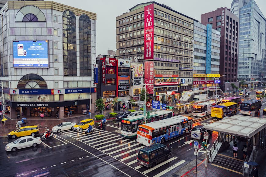 Elevated view of traffic and buses in downtown Taipei, Taiwan