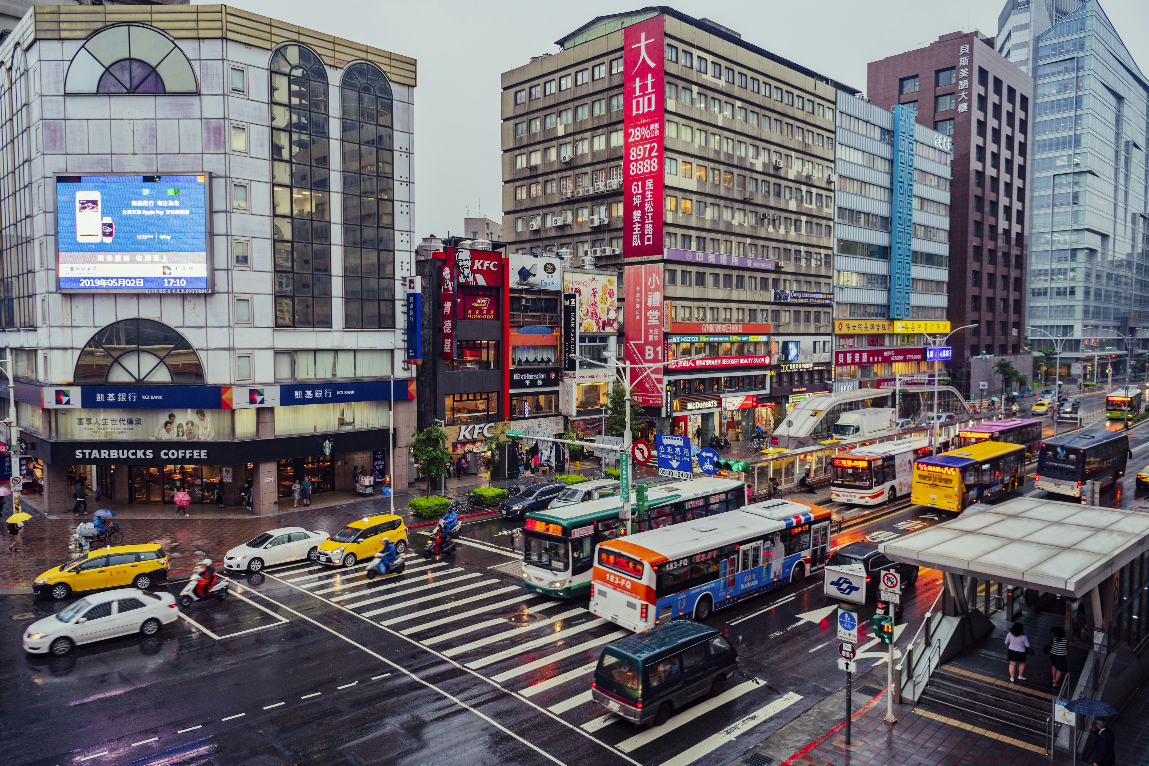 Elevated view of traffic and buses in downtown Taipei, Taiwan