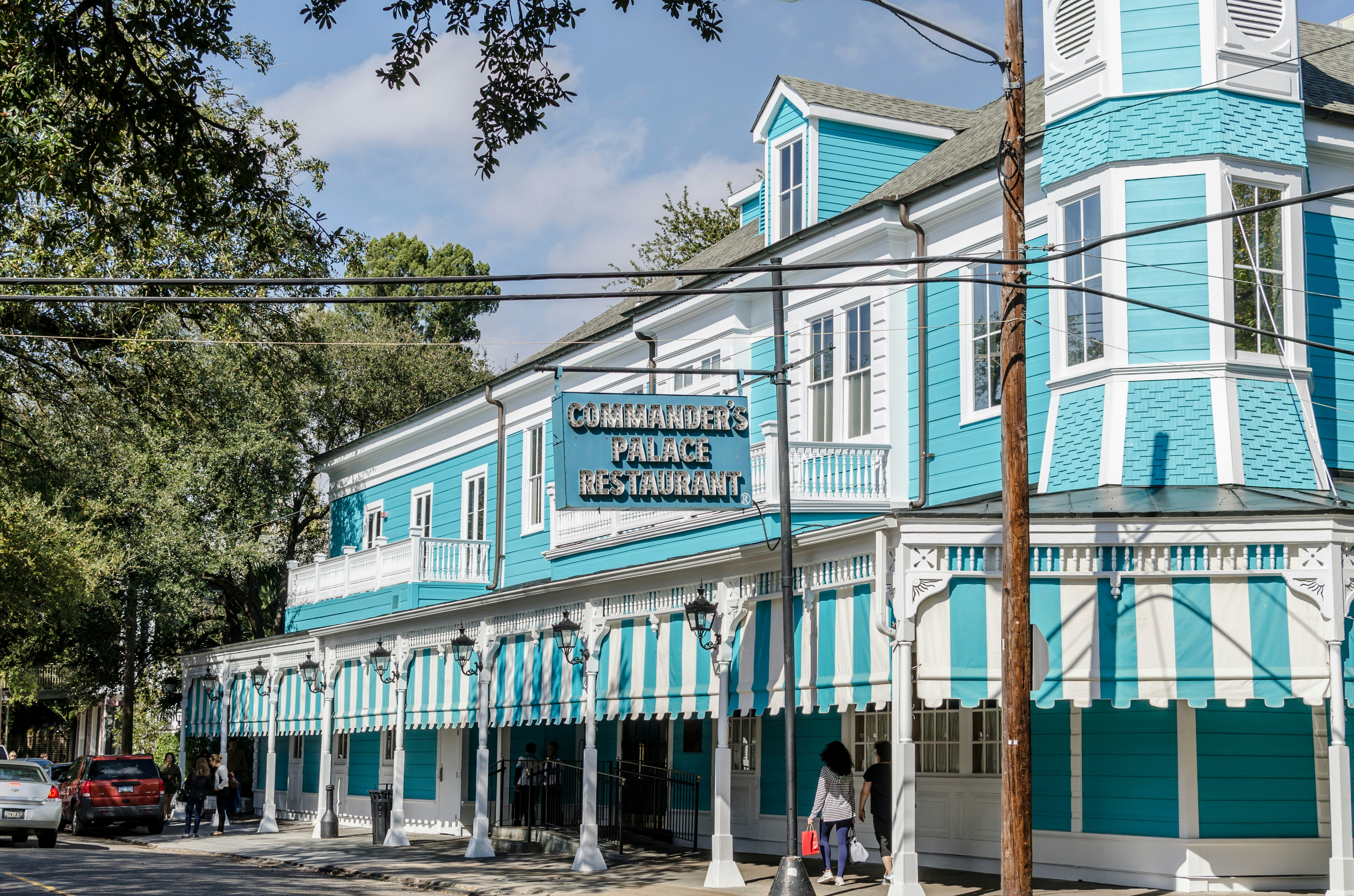 The bright blue facade of Commander's Palace restaurant in the Garden District of in New Orleans, Louisiana, USA