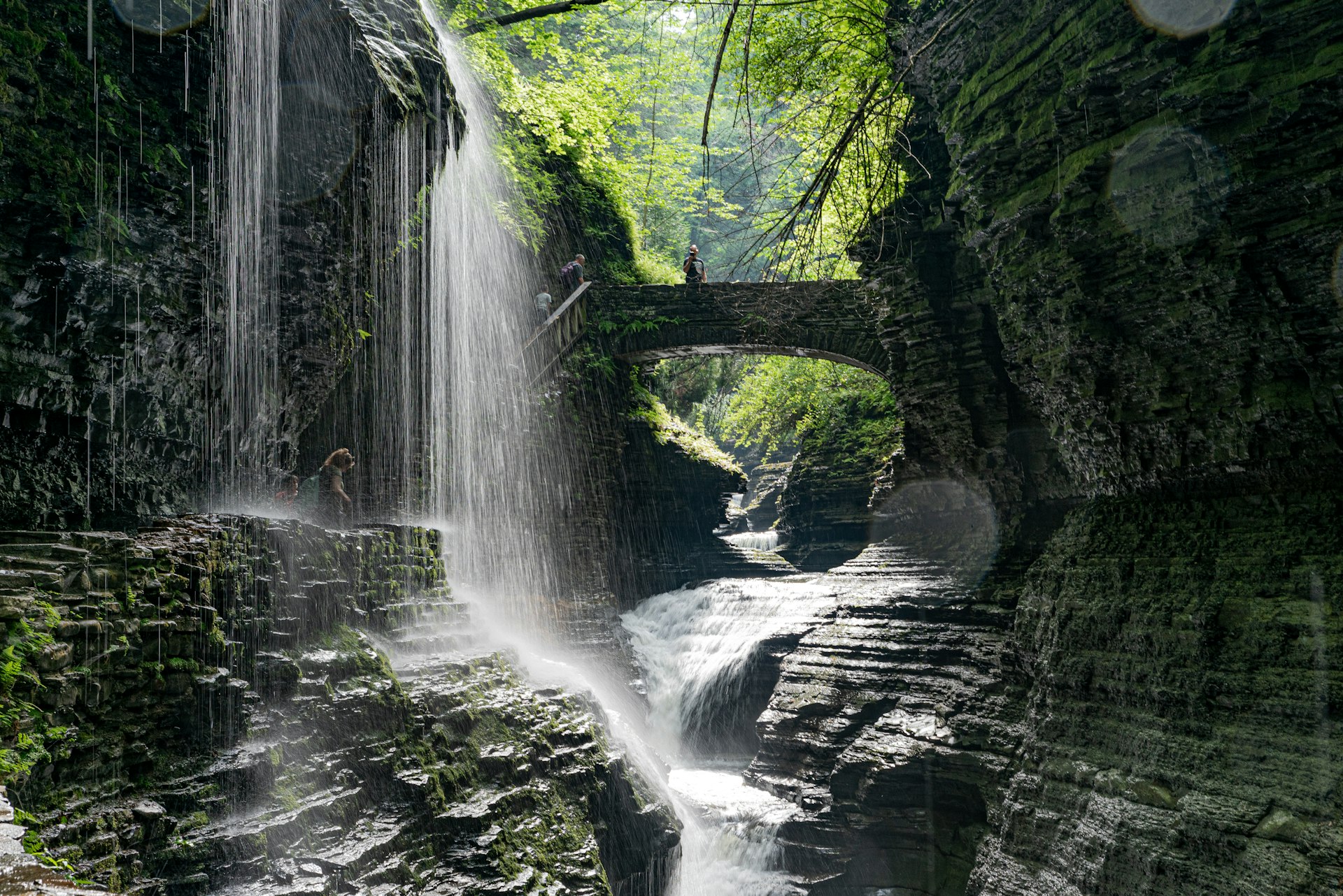Water splashes over rocks at Buttermilk Falls State Park, New York State