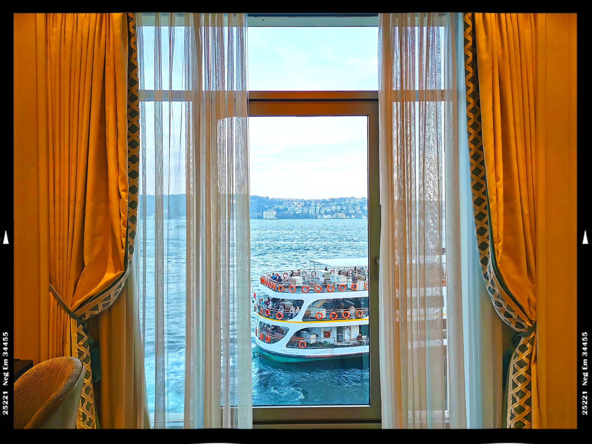 View of a boat on the Bosphorus from a hotel room