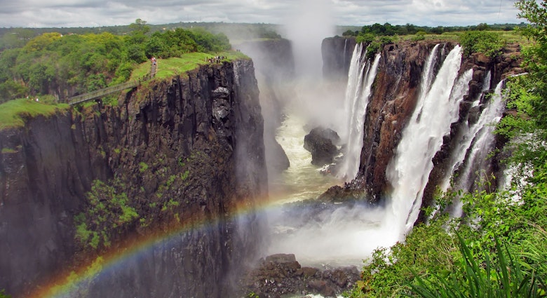 Rainbow over Victoria Falls on Zambezi River 