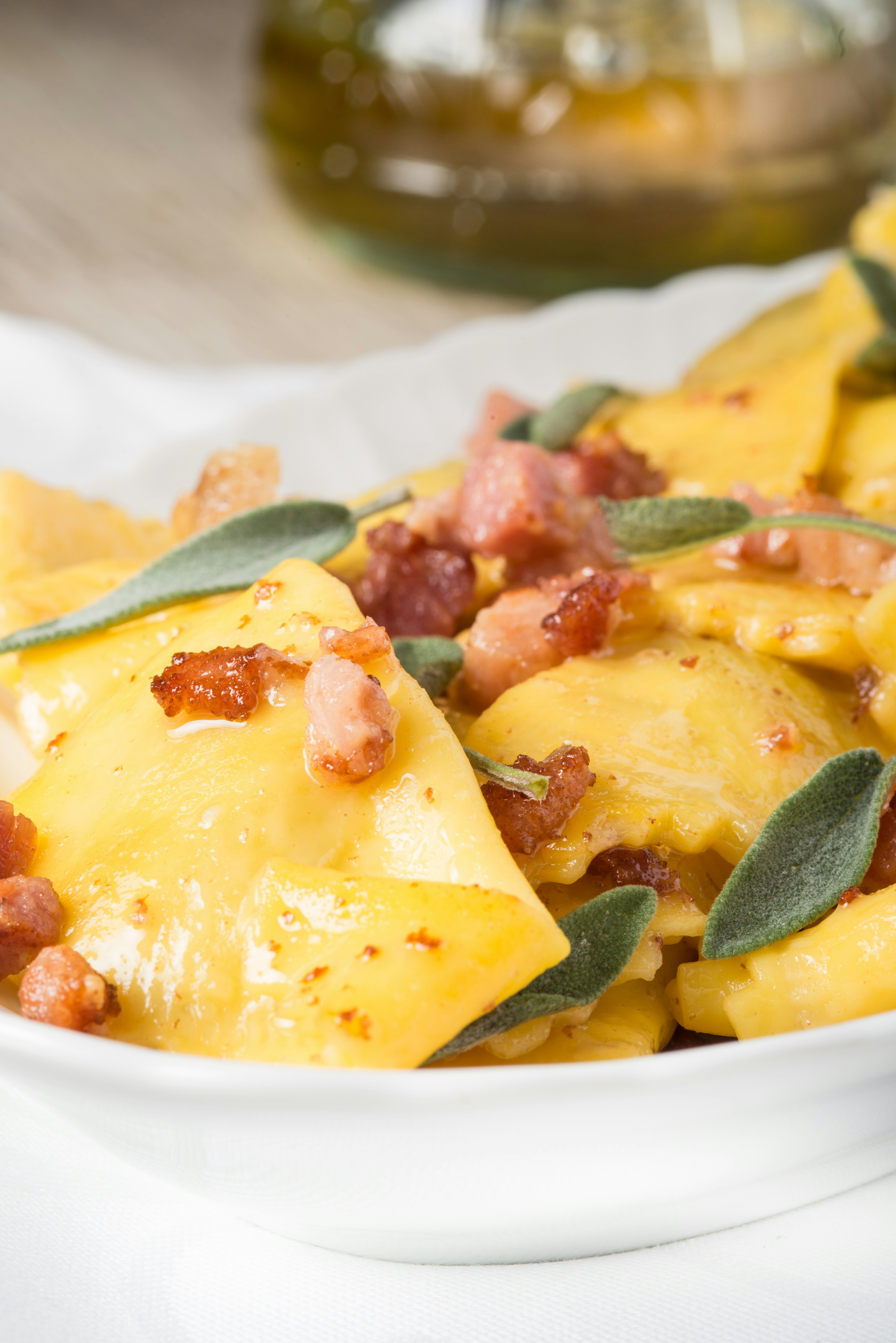 Delicious Italian pasta in a white bowl.