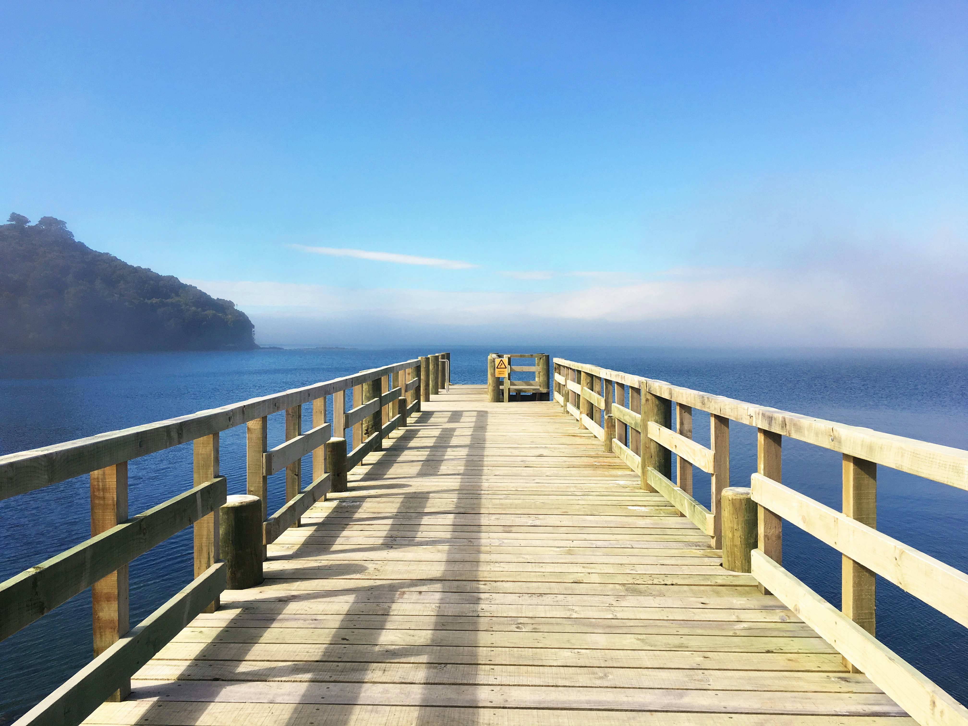 A pier goes out into the water.