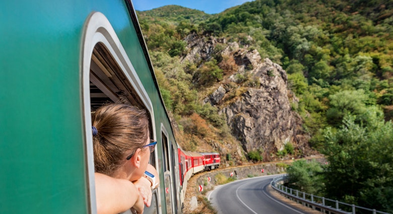 red retro train in Bulgaria mountains, Alpine railway in the Balkans
