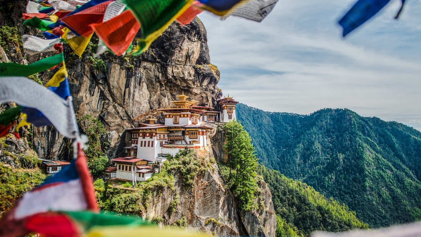 Taktsang Monastery, also known as the Tiger's Nest, with prayer flags view © Shutterstock