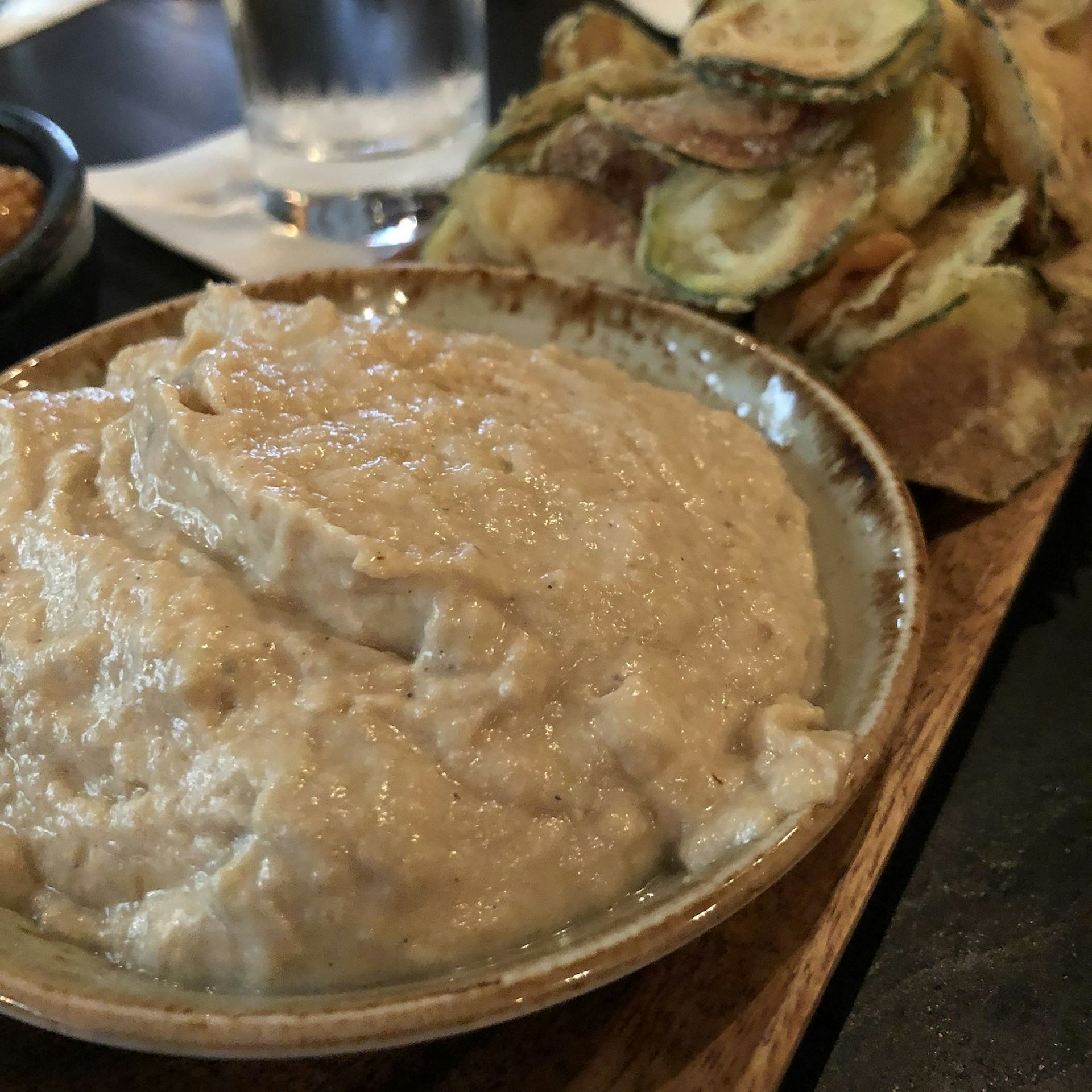 A dish of hummus at Committee Restaurant, Seaport District, Boston, Massachusetts, USA