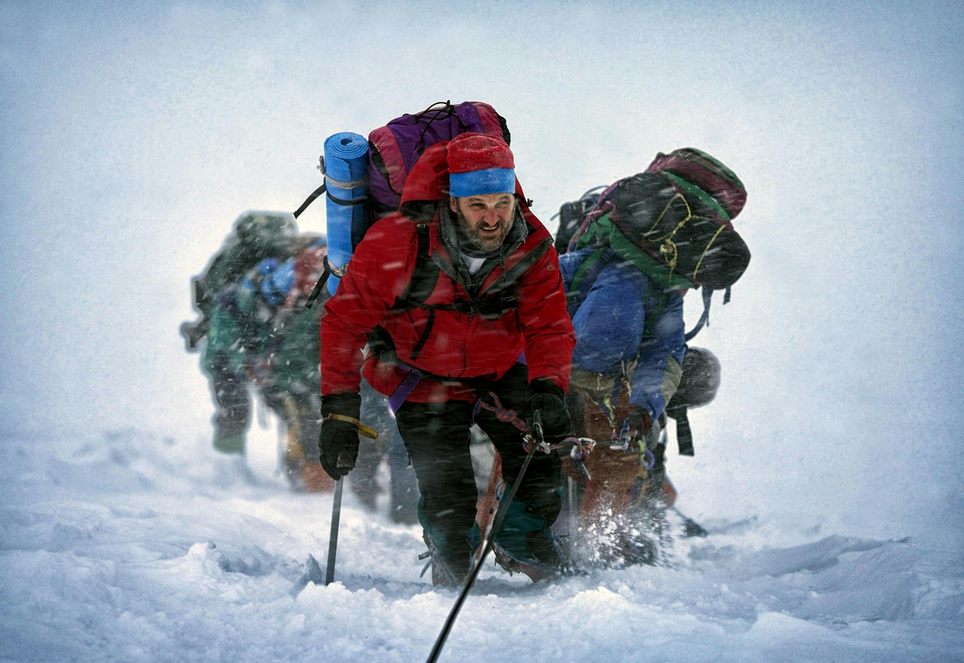 A still from the 2015 film “Everest” depicting mountain climbers on a snowy slope