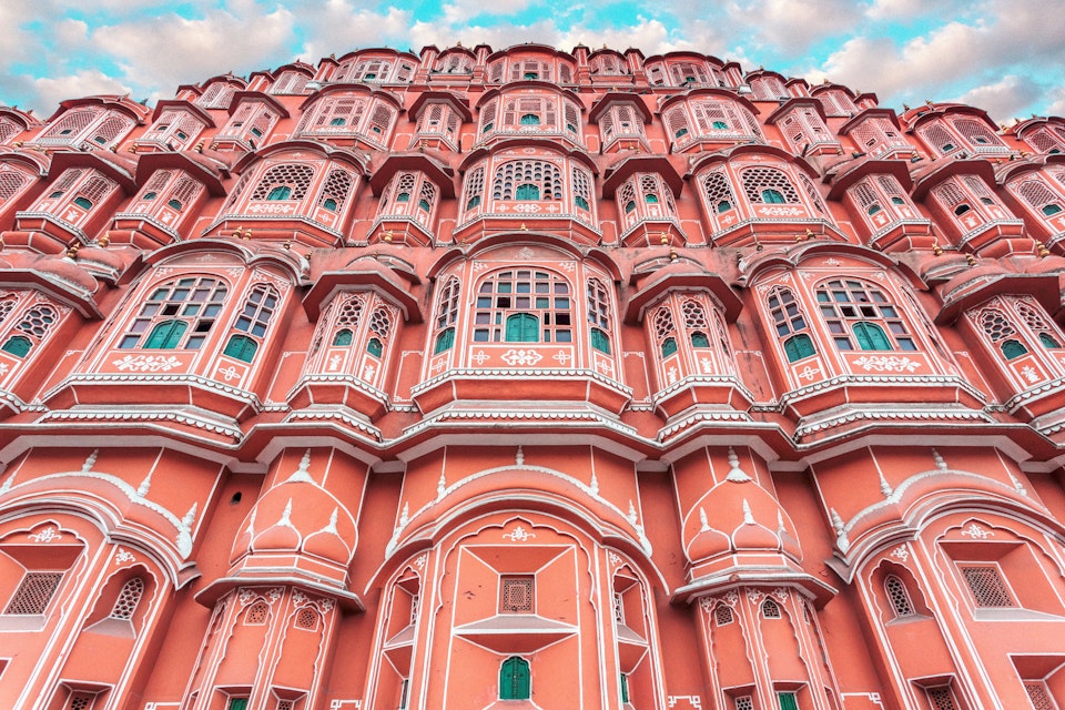 Hawa Mahal ("Palace of Winds" or "Palace of the Breeze") - a palace in Jaipur, India. It is constructed of red and pink sandstone.