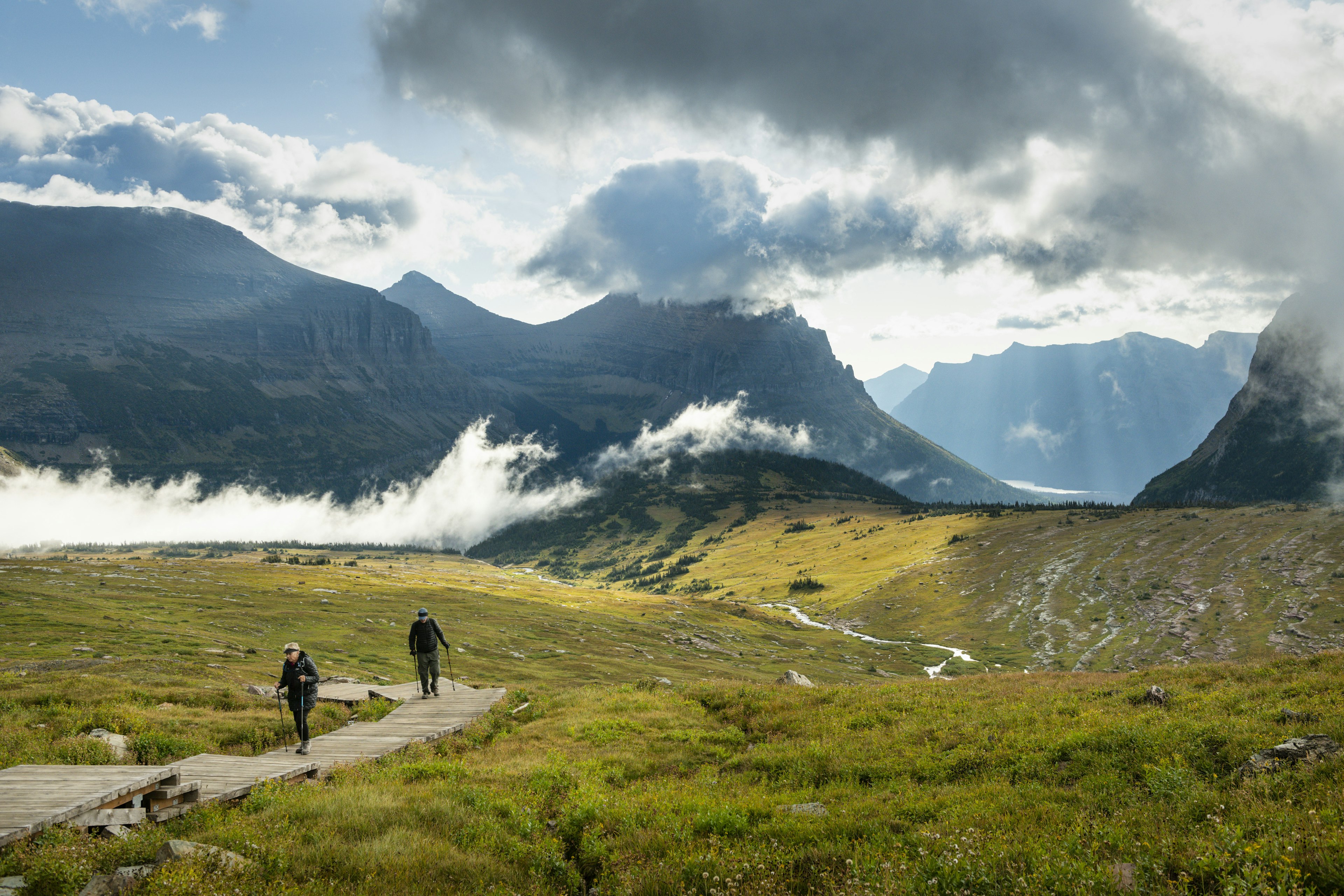 Hikers on Logan Pass trail to Hidden Lake, Glacier National Park, Montana, USA