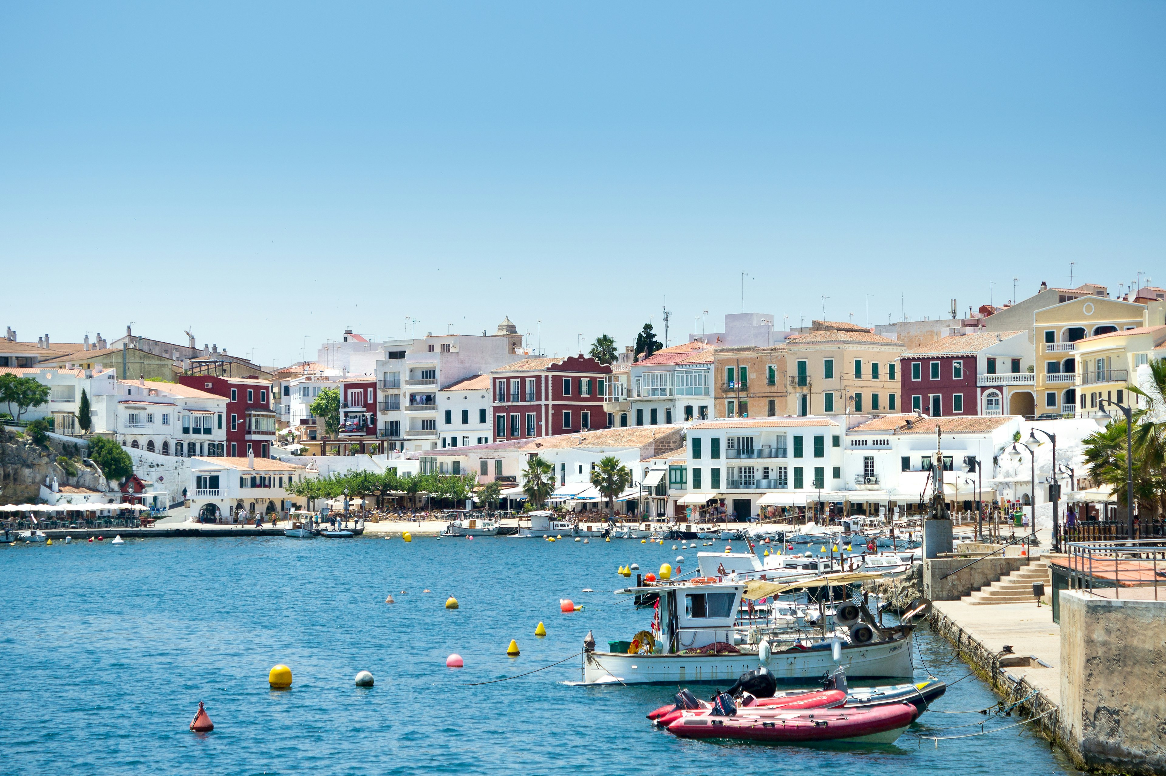 A habour on Menorca in the sunshine.