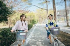 Two asian women renting bicycles to travel in the city
1396026867