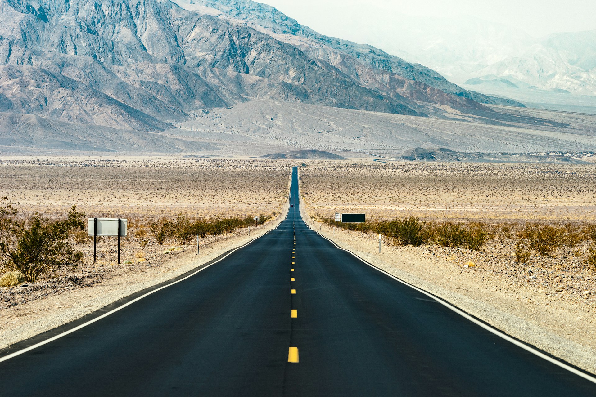 A road in Death Valley disappearing into the horizon