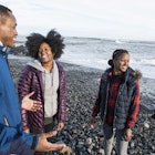 Three smiling African American people standing on gravel beach and talking
1011210070
african american, african american ethnicity, black, conquer, help, helping, helping hand, overcoming, sunshine
Three people standing on a gravel beach and talking in Maine