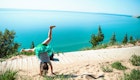 705209981
One Person, Lifestyles, Childhood, Outdoors, Turquoise Colored, Beauty In Nature, Boardwalk, Scenics, Shore, Day, Sleeping Bear Dunes National Lakeshore, Plant, Girls, Travel, Idyllic, Real People, Travel Destinations, Freedom, Carefree, Casual Clothing, Enjoyment, Handstand, Tourism, Leisure Activity, Sunlight, Cartwheel, Sky, Non-Urban Scene, Rear View, Practicing, Lake, Nature, Lake Michigan, Water, 4-5 Years, Horizontal Image