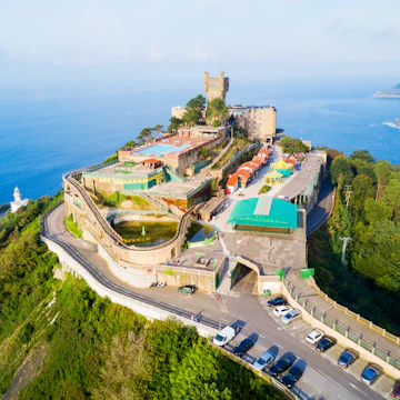 Monte Igueldo Tower and amusement park on the Monte Igueldo mountain.
1145273030
aerial, amusement, atlantic, attraction, basque, bay, beach, cantabrian, city, cityscape, coast, coastline, concha, country, day, donostia, drone, europe, igueldo, island, landmark, landscape, marina, marine, mirador, monte, mountain, ocean, panorama, panoramic, park, san, scenic, sea, seaside, sebastian, sky, skyline, spain, summer, tourism, town, travel, view, viewpoint, water