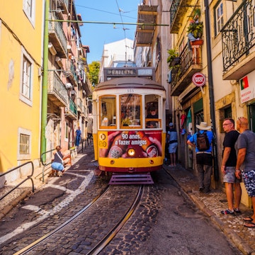 August 22, 2017: People stepping to the sidewalk in order to let the street car pass in the streets of Lisbon.
755689225
urban, tourist attraction, city center, pedestrian street, street tramway, front view, classic, horizontal, lisboa, old, old fashioned, people, portugal, portuguese, rail, rail transport vehicle, summer, tourism, transport, travel, yellow, alfama, busy, cable car, campo ourique, capital, center, city, cobblestone street, day, electric, famous, journey, known, line, martin moniz, moving aside, moving away, pavement, prazeres, sidewalk, sightseeing, stepping away, street, streetcar, sunny, tourists, tram, trolley car, unique
