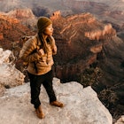A woman looking out towards the Grand Canyon