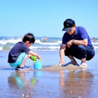 Wasaga Beach, Ontario, Canada - August 11, 2019 : Grandpa playing sands with grandson on beautiful beach against group of kids jumping into the blue water. Family fun and family generations background; Shutterstock ID 1877741203; your: Brian Healy; gl: 65050; netsuite: Lonely Planet Online Editorial; full: Best beaches in Canada
1877741203
active, activity, beach, blue, boy, bucket, care, caregiver, child, childhood, cute, emotion, enjoying, family, family fun, family love, family vacation, fun, generations, grandchild, grandfather, grandpa, grandson, happiness, happy, holiday, joy, kid, leisure, lifestyle, love, nature, ocean, outdoor, people, play, sand, sands, sea, seaside, summer, toddler, together, togetherness, touch, travel, two, vacation, water, young