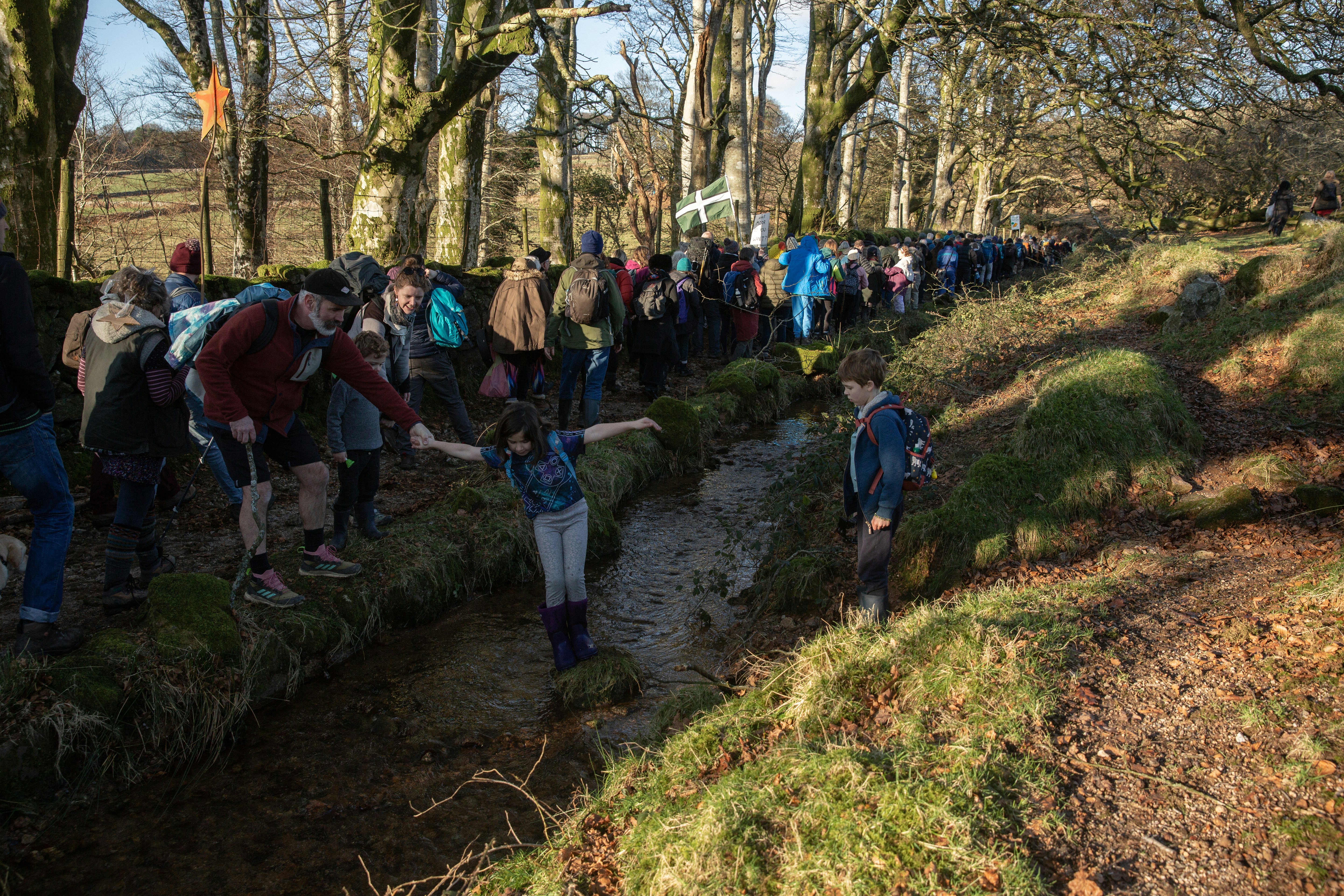 rotestors walk up to Stall Mall at Dartmoor National Park in protest at wild camping ban