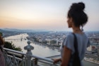 Woman looking at Budapest at sunset
1160640166