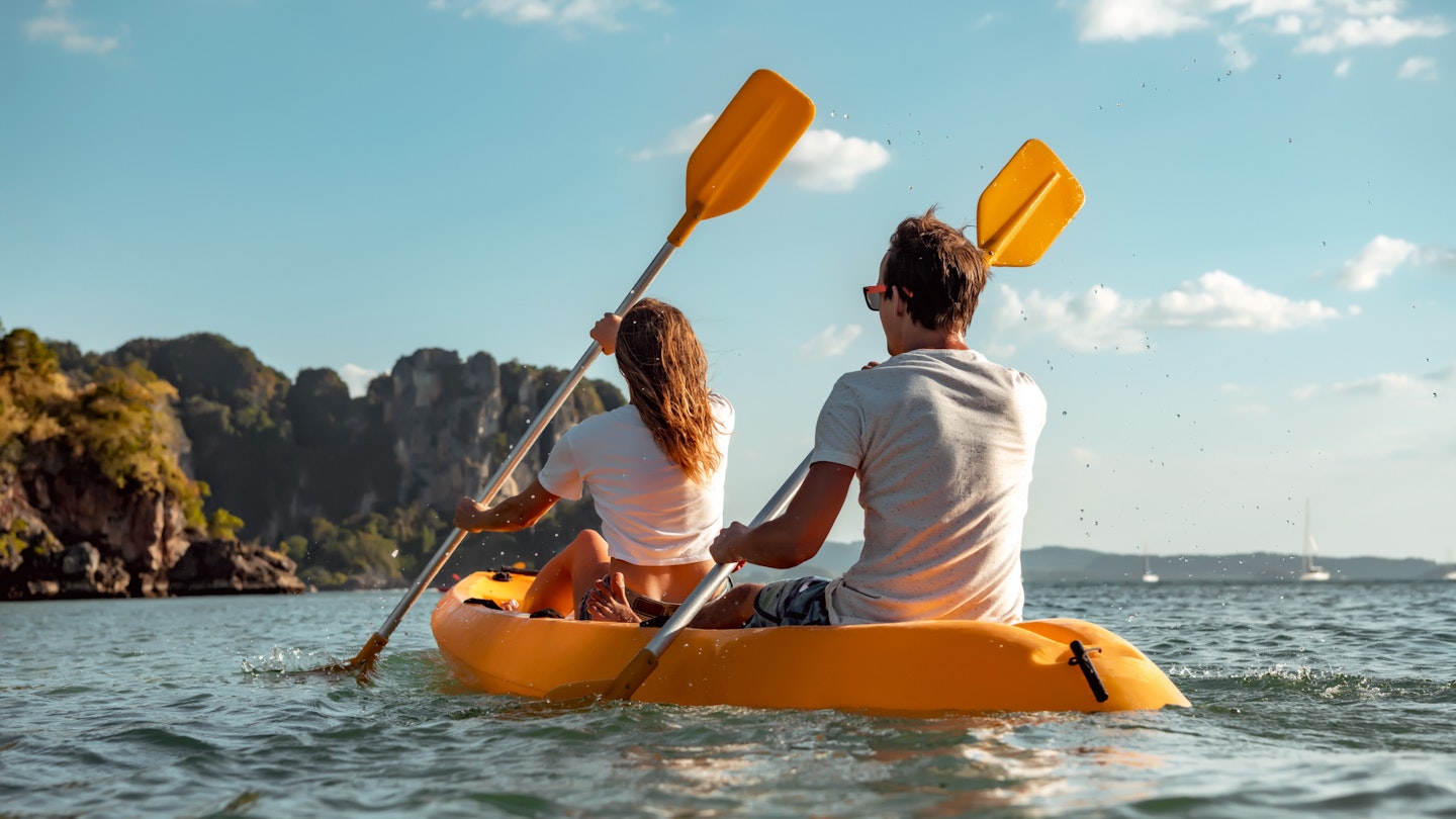 Sea kayaking or canoeing concept with young couple kayakers at tropical bay. Phranang bay, Krabi, Thailand
1369254947