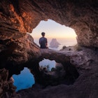 Enjoying the sunset of Es Vedra inside a cave with 3 windows, Ibiza,
1403549041