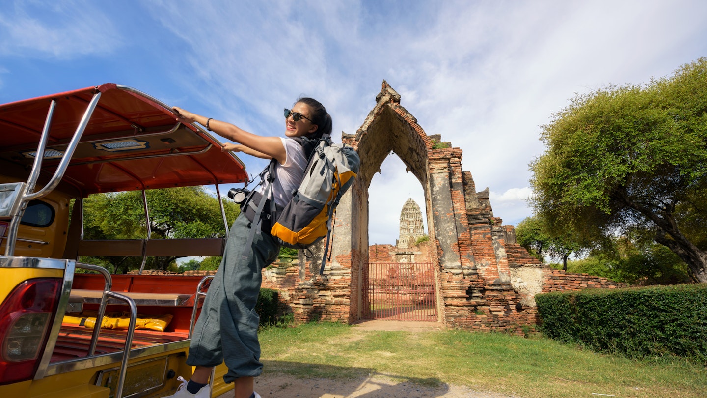 Traveling with a Taxi Tuk Tuk in Phra Nakhon Si Ayutthaya Thailand.
964742848
temple, asian, ayutthaya, outdoor, camera, vacation, tuk tuk, lifestyle, beautiful, holiday, traveler, background, trip, young, person, alone, woman, landmark, thai, urban, vintage, female, tuk, girl, tuk-tuk, park, transport