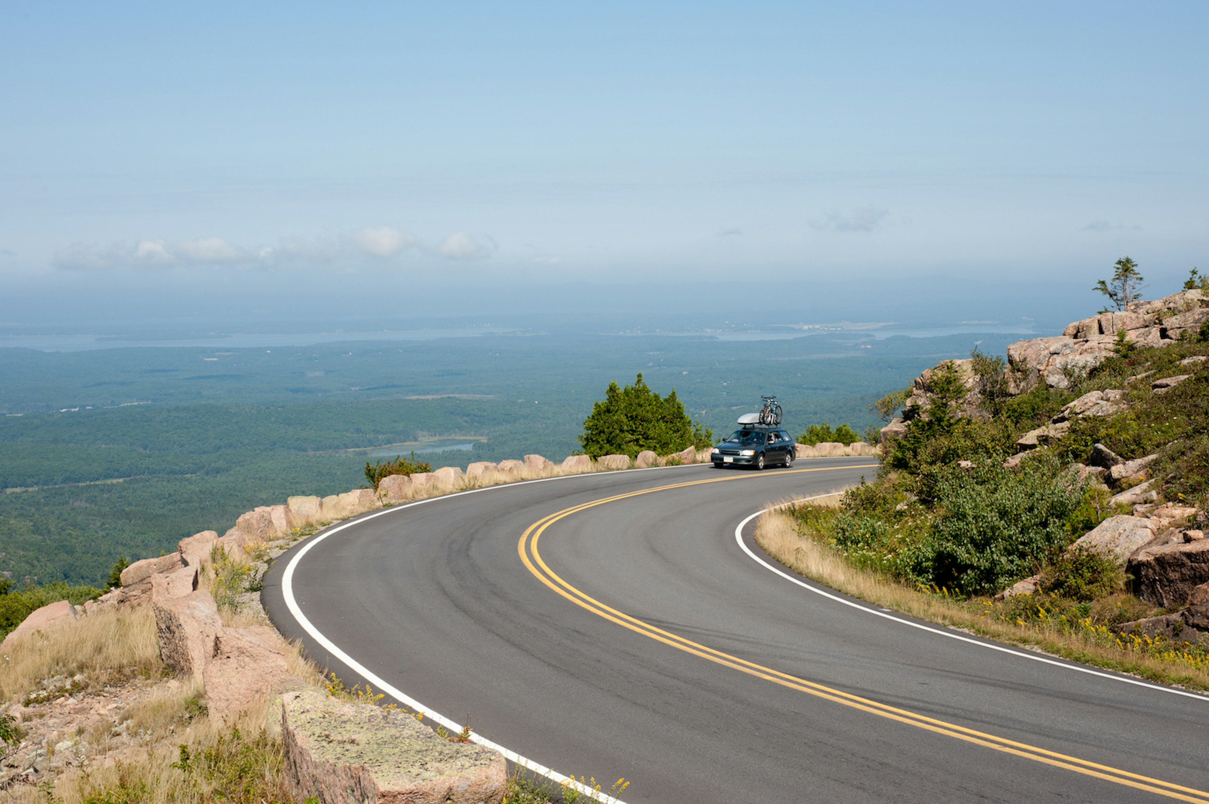 A car on on Cadillac Mountain Drive in Acadia National Park, Maine, USA