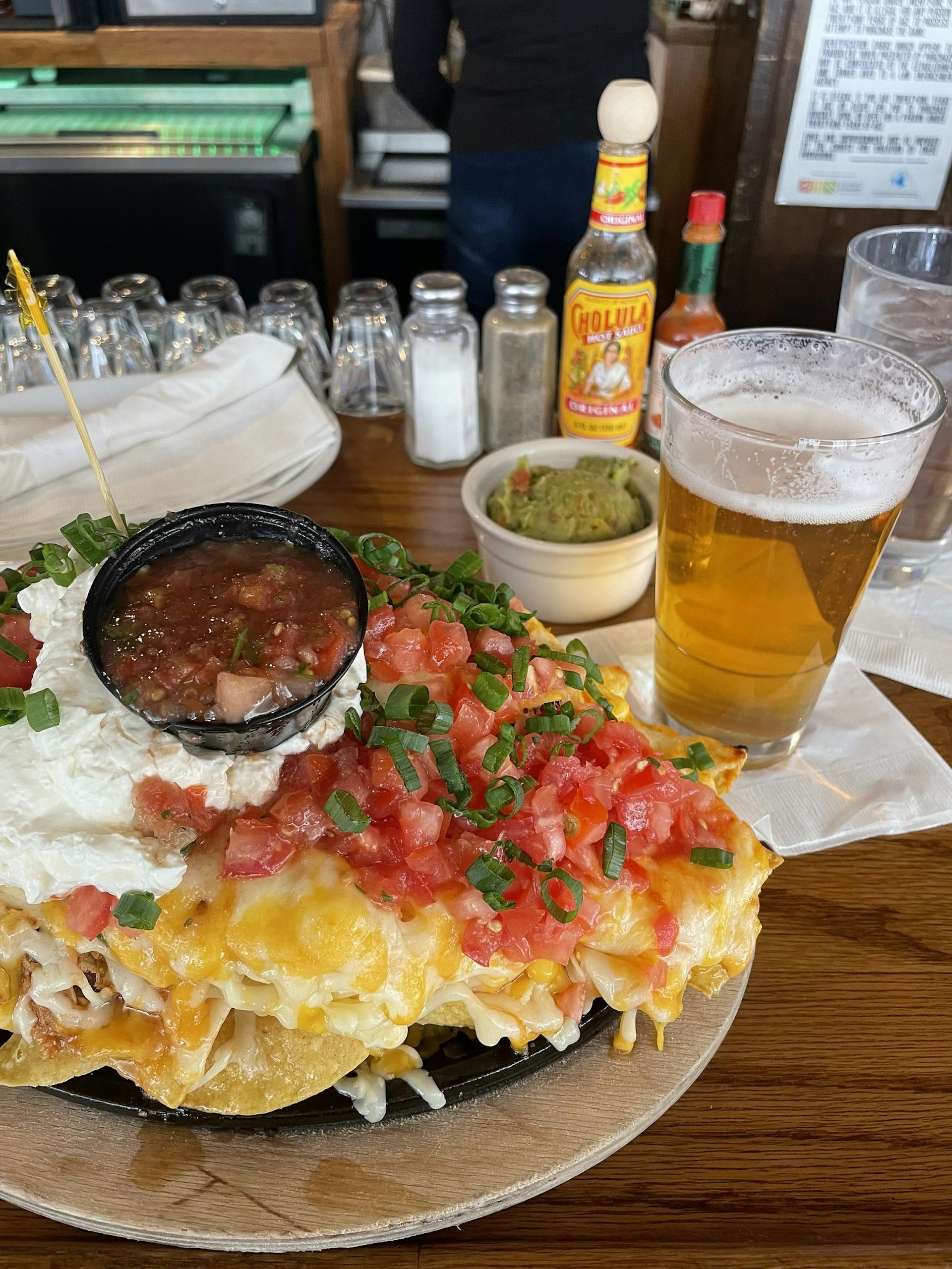 Plate of nachos and beer at the Red Lion