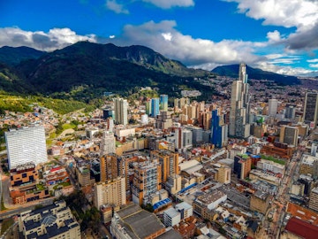 Bogota cityscape of big buildings and mountains and blue sky
1182337590