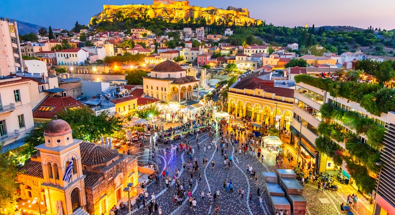 Crowd gathers at Monastiraki Square at night with the ancient Acropolis in the background. 
1193397715
acropolis, aerial, ancient, ancient greece, architecture, athena, athens, athens by night, athens from above, attraction, capital, city, cityscape, civilization, classical, destination, europe, evening, famous, greece, greek, hellas, hellenic, heritage, history, holiday, illuminated, landmark, landscape, light, megalopolis, monastiraki, monastiraki athens, monument, mosque, night, panorama, parthenon, plaka, rock, ruins, scenic, square, sunset, temple, tourism, touristic, travel, urban, vacation